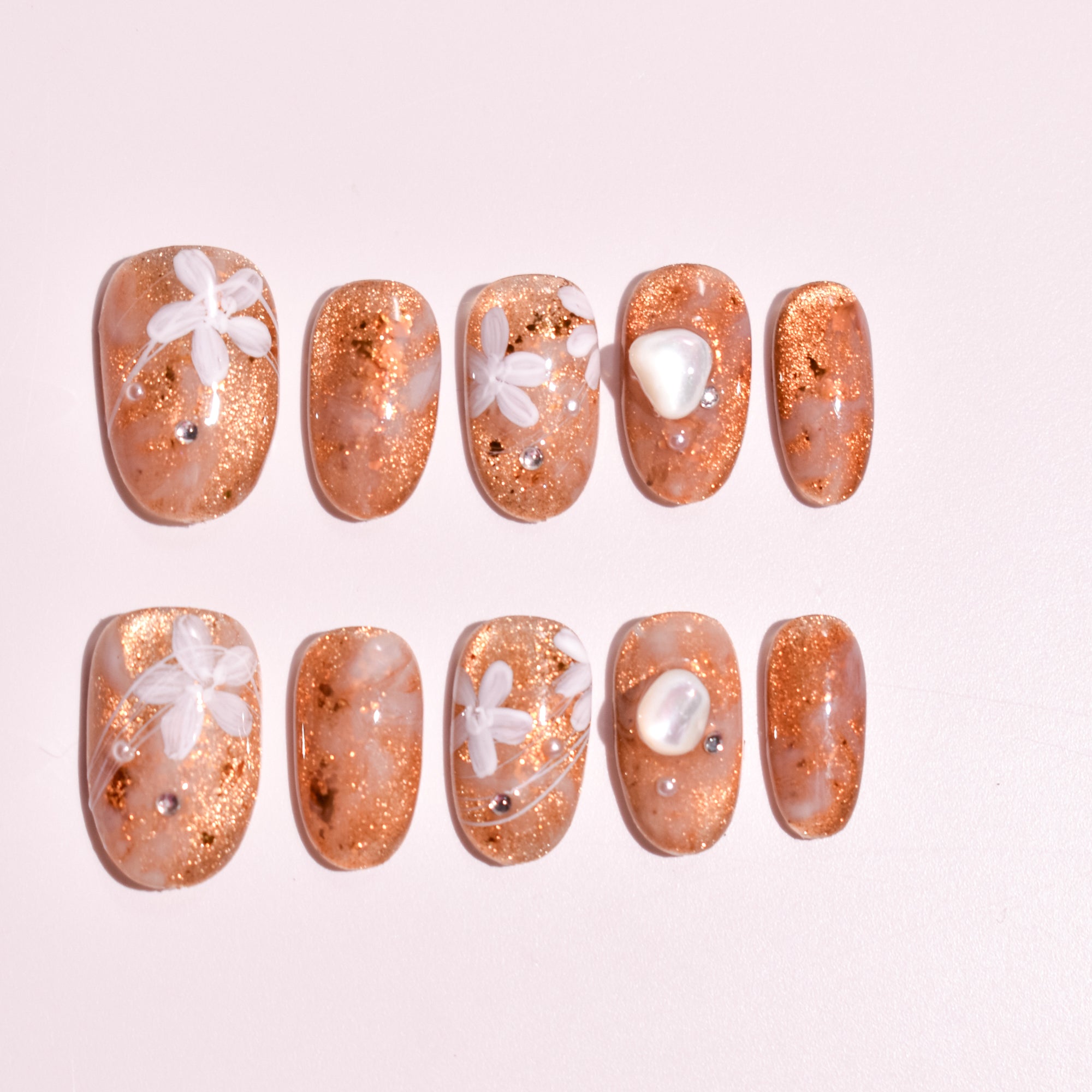 Amber Pearl Bloom | Medium Oval Gold Glitter Floral Press-On Nails