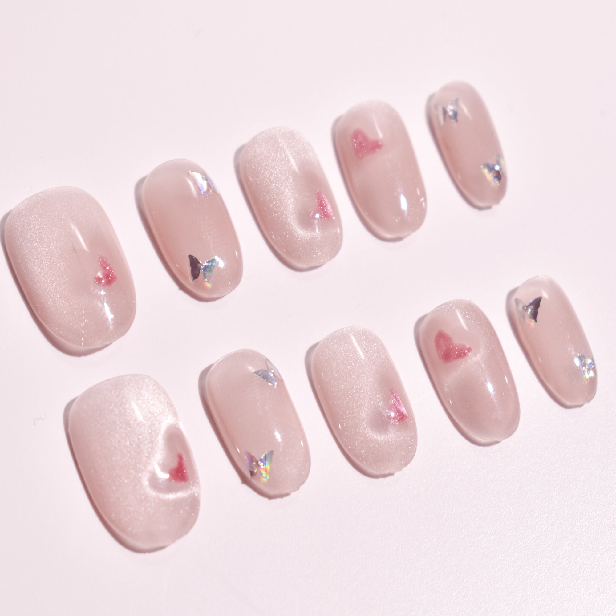 Blush Flutter | Medium Oval Nude Pink Press-On Nails with Heart & Butterfly Accents