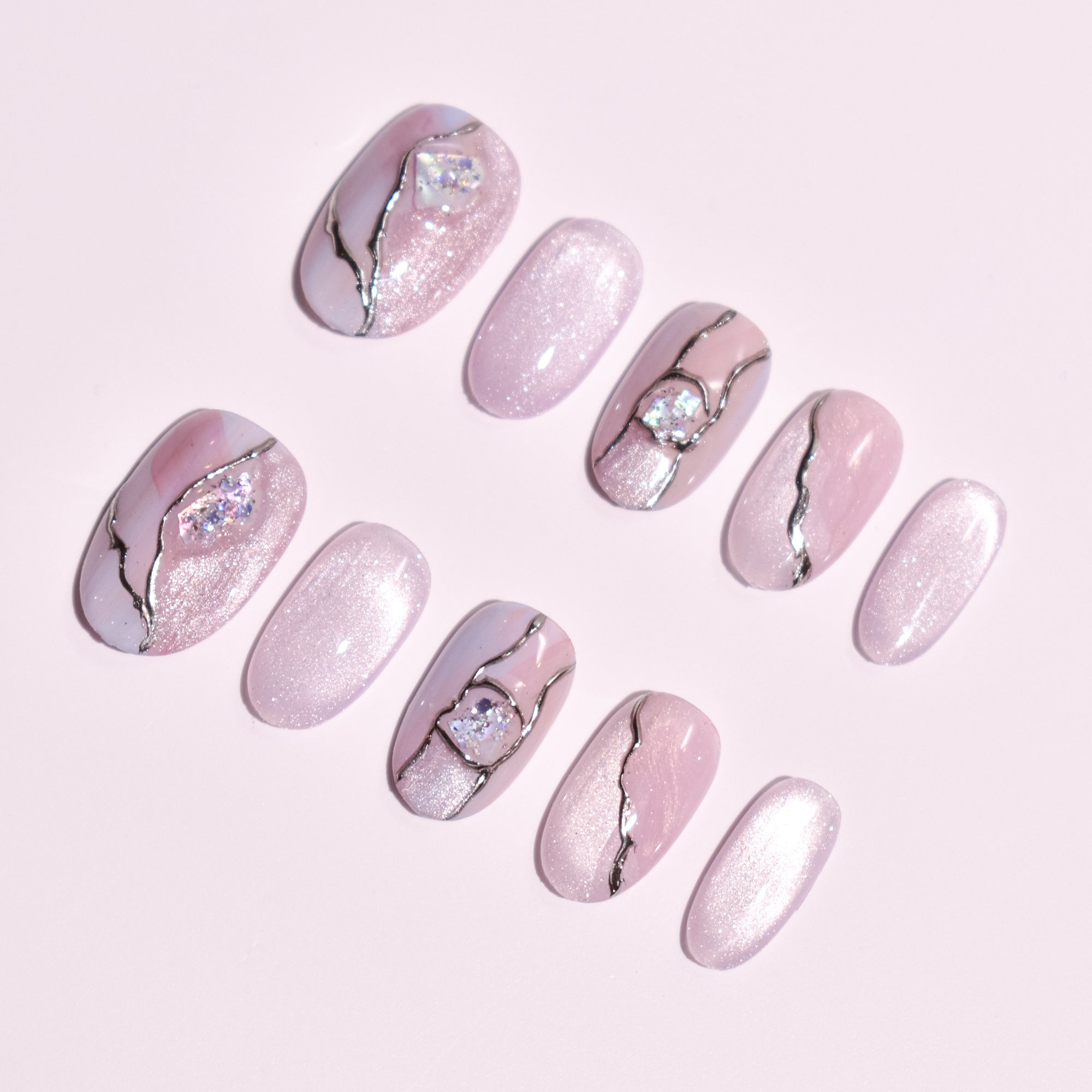 Blush Faultline | Medium Oval Pink Press-On Nails with Gold Vein Marble & Crystal Accents
