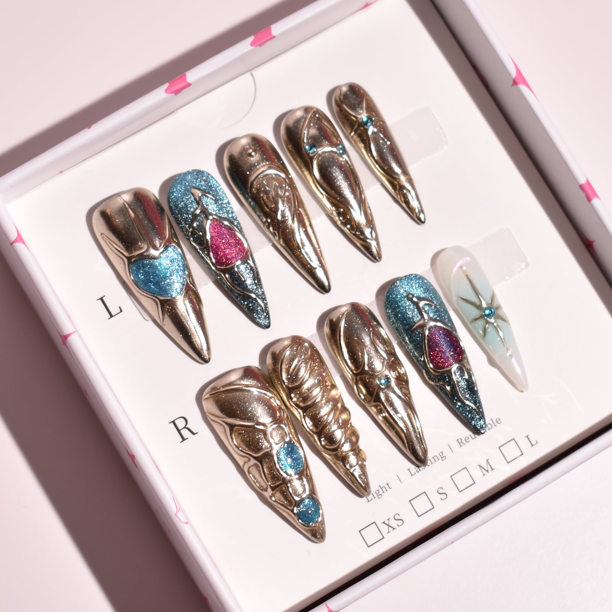 Aureate Dominion Long Stiletto Gold Chrome Sculpted Press-On Nails with Blue & Magenta Crystal Inlays | b3B87